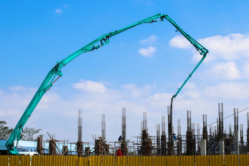 construction building works with concrete pump