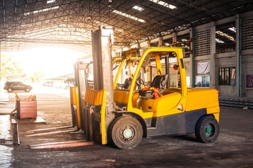 yellow forklift on a Melbourne suburban construction site 