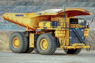 yellow rigid rear dump truck on an Australian construction site