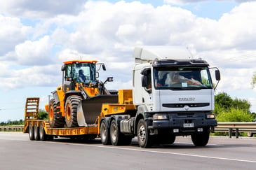 low loader truck with tractor