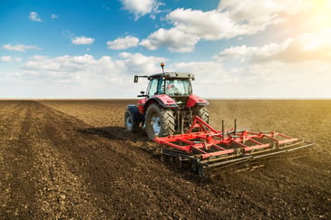 tractor plowing farm